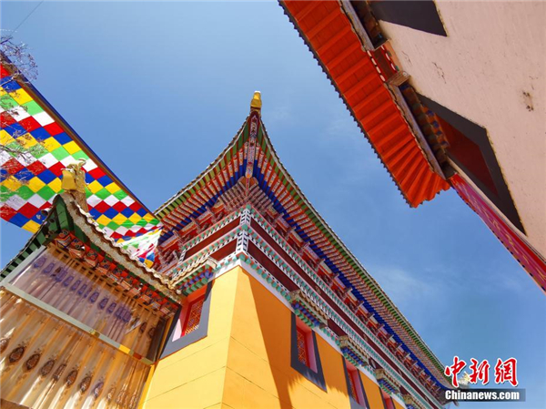 世界彩绘面积最大的单体藏传佛殿建筑在青海被认证3.jpg