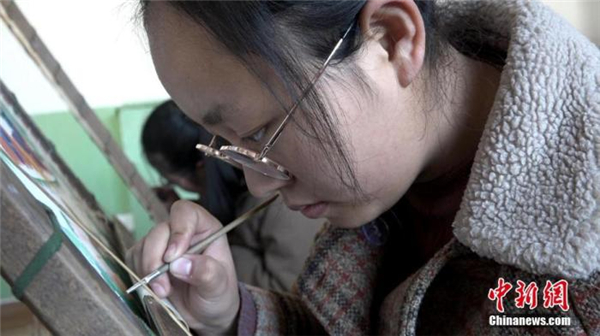 西藏唐卡艺术：画笔下的新女性“色彩”2.jpg